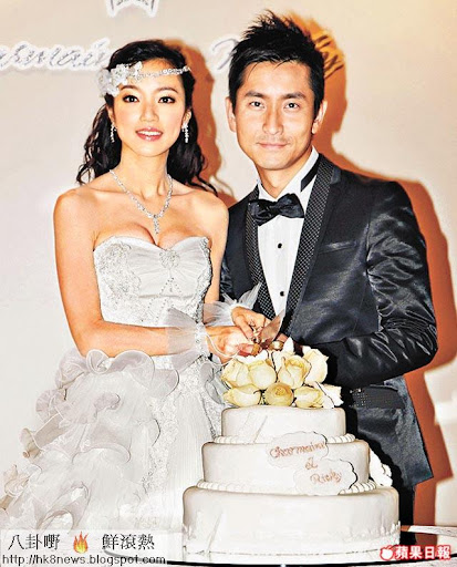 李思欣穿上婚紗穀胸與老公仔範振鋒切蛋糕。