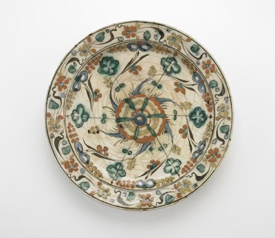 Plate with low foot | Origin:  Iran | Period: early 17th century  Safavid period | Details:  Not Available | Type: Stone-paste painted under glaze | Size: H: 5.9  W: 34.0  cm | Museum Code: F1903.229 | Photograph and description taken from Freer and the Sackler (Smithsonian) Museums.