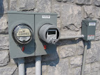 Installation of a dual meter for a Grid Tied Solar and Wind Array on Knowlton Lake north of Sydenham in Holleford.