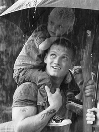 dad and son in the rain