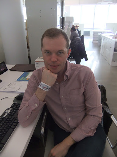 Sean Hendricks, digital project manager, models another Egyptian-themed bracelet.