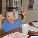 J enjoying his spaghetti. Quite the mess!