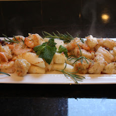 Shrimp and Calamari with Mint Pesto on Sprigs of Rosemary.