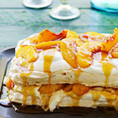 Almond Pavlova with Peaches, Cream, and Salted Peach Caramel