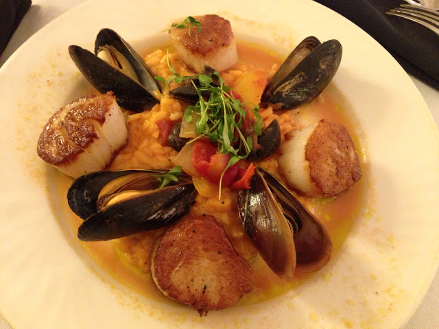 Pan-seared Sea Scallops with tomato risotto, escargot, & mussels. Yummy!