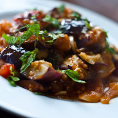 Charred Eggplant and Tomatoes with Harissa and Mint