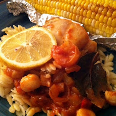 Seafood creole orzo risotto with elote corn