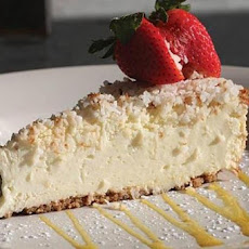 Coconut-Lime Cheesecake with Mango Coulis