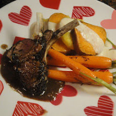 Spicy Dark Chocolate Roasted Rack of Lamb with Apple-Brandy Sauce
