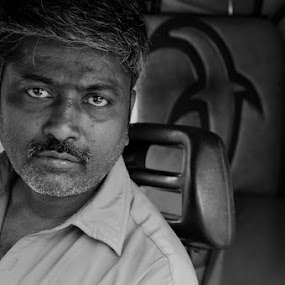 In for a Ride! by Akash Kumar - Novices Only Portraits & People ( black n white, catch light, emotions, driver, rikshaw driver catchlight, portrait )