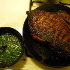 Perfectly grilled flank steak with chimichurri sauce