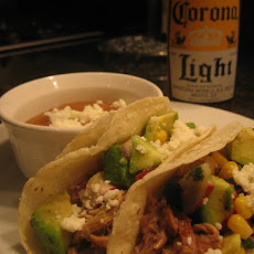 Slow Cooked Pork Carnita Tacos with Corn and Avocado Salsa