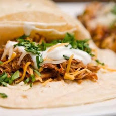 Shredded Chicken and Tomatillo Tacos With Queso Fresco
