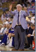 Frank Layden orders three hot dogs and a beer