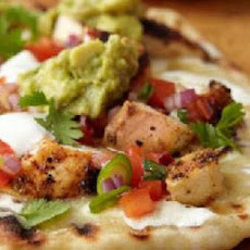 Grilled Savory Taco Chicken Pizza with Guacamole and Lime Chipotle Salsa