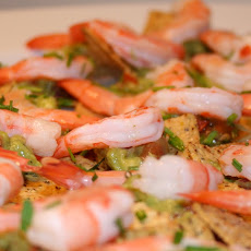 Avocado & shrimp topped multigrain tortilla chips