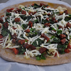 BigBear’s Welcome Home Pizza (Sun-Dried Tomato, Basil, Chorizo and Manchego on a Red Wine Crust)