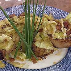 Pan-roasted Pork Chops with Sauteed Cabbage and a Shrimp, Crabmeat and Mirliton Dressing