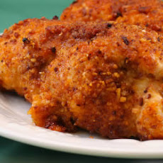 Baked Chicken Stuffed with Sun-Dried Tomato Pesto, Basil, and Goat Cheese
