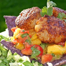 A Salad of Seared Scallops, Mango Salsa and Tortilla Strips