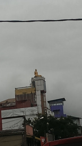 Golden Buddha Statue Watch Tower