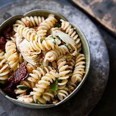 Pasta with Artichoke Hearts, Sun Dried Tomatoes, and Toasted Almonds