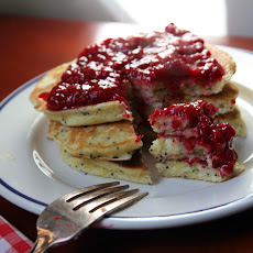 Lemon Poppyseed pancakes with raspberry sauce