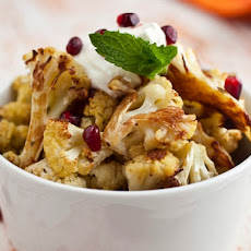 Cook the Book: Cumin Seed Roasted Cauliflower with Salted Yogurt, Mint, and Pomegranate Seeds