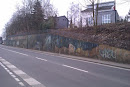 Grafitikunst an einer Stützmauer