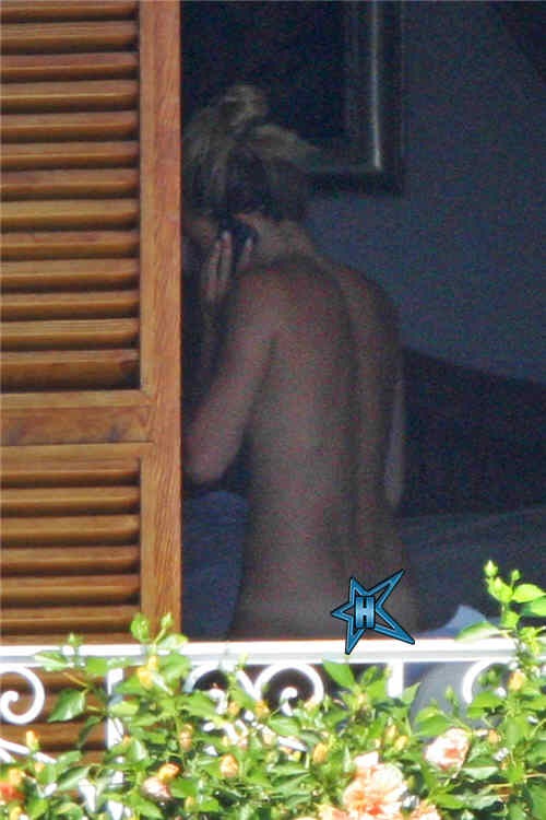 [Sienna Miller topless en italia con Getty 1[5].jpg]
