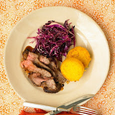 Chili-Rubbed Flank Steak With Cabbage Salad And Polenta Rounds