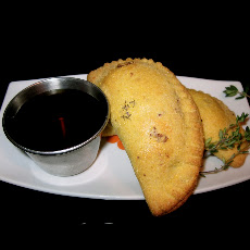 Caramelized Pear and Bacon Empanadas with Thyme Maple Syrup