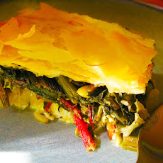 Harvest pie with swiss chard, cheese, orange zest and fennel