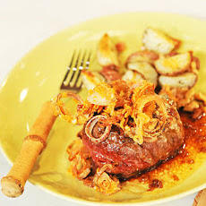 Pan-Roasted Filet Mignons with Potato-Walnut Confit, Port Wine Reduction, Stilton Cheese, and Shallot Rings