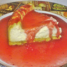 Cheesecake with Cranberry Pomegranate Sauce