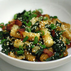 Rice Cakes with Kimchi, Bacon, and Spinach
