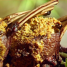 Pistachio Crusted Rack of Venison with a Cranberry, Black Pepper and Sage Reduction Sauce