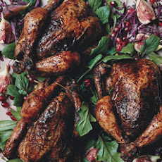 Spice-Rubbed Cornish Hens with Haroseth Stuffing and Sherry Jus