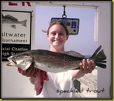 Jennifer Hinson with a 3 lb. 5 oz. speckled trout caught on live shrimp while fishing from Ocean Crest Pier.               