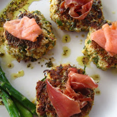 Cauliflower fritters with smoked salmon, prosciutto herbed dressing.