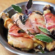 Chicken drumsticks wrapped in pancetta