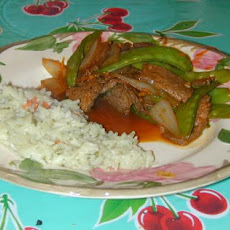 Tangerine Stir-Fried Beef With Onions and Snow Peas