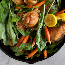 Skillet Roasted Chicken Thighs with Dandelion Greens + Baby Carrots