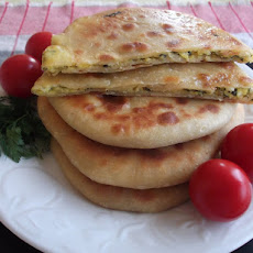 Georgian Khachapuri Filled with Ramp, Green Onions, Herbs and Cheese