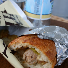 Sausage Sandwiches with Onion Relish and Pepperocinis
