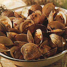 Steamed Clams and Lobster with Shallot Butter, Corn, Sausages and Potatoes