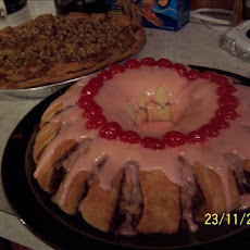 Cinnamon Roll Tea Ring With Cherry Frosting