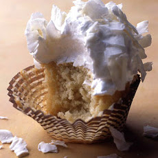 Coconut Cupcakes with Seven-Minute Frosting and Coconut Flakes