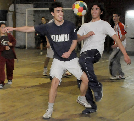 Emanuel, right and in a white shirt, accepted Christ as his savior at our Sport Night.