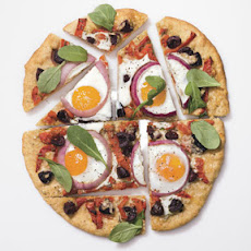 Pizza with Eggs, Roasted Red Peppers, Olives and Arugula